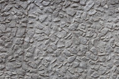 Beton bir duvarın yüzeyi. Moloz taşlardan kurtulmuş..