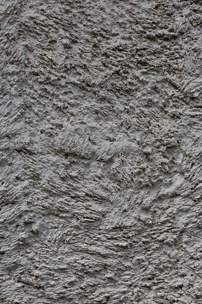 一次ラフ石膏壁のクローズアップの表面の質感 — ストック写真