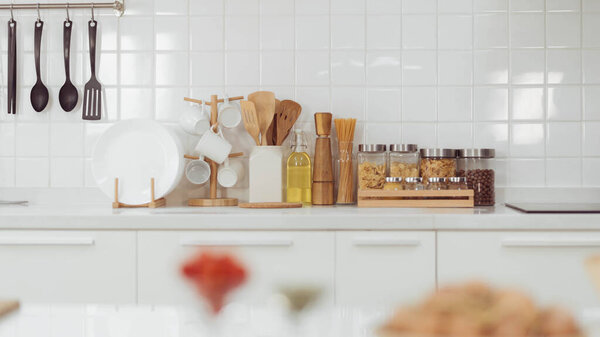 Kitchen accessories, kitchen wood utensils in white kitchen room, ss