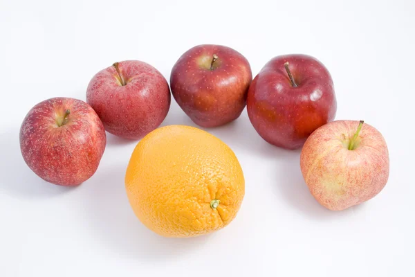 An Orange among Apples — Stock Photo, Image