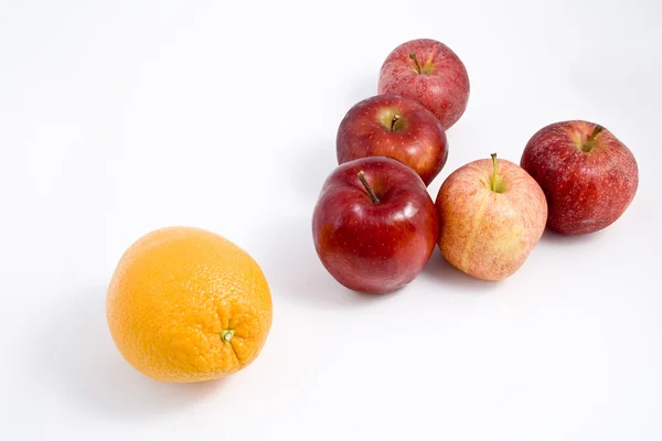 An Orange among Apples — Stock Photo, Image