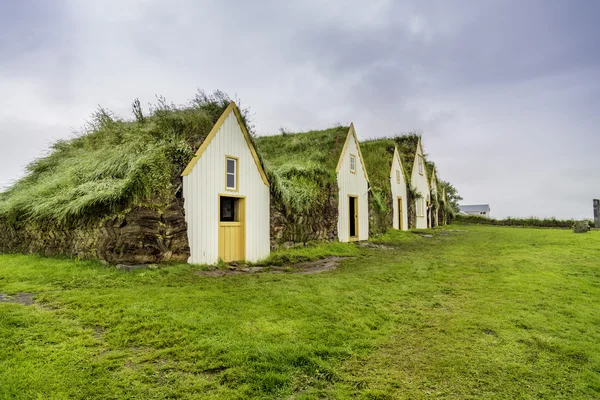 Gras huizen — Stockfoto