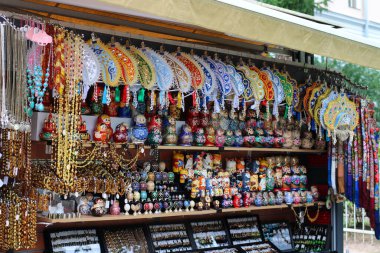 Souvenir shop with kokoshniks, caskets, matryoshkas, amber ornaments, shawls, costume jewelry and much more. The town of Pushkin, near Catherine's Palace. clipart