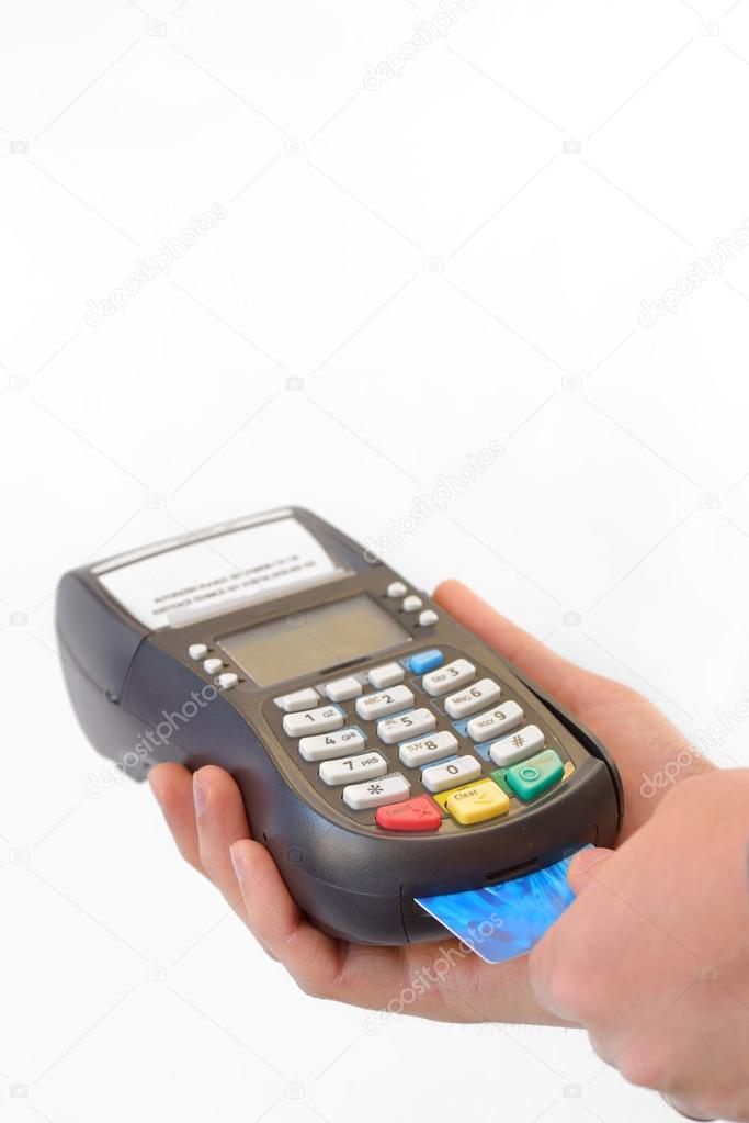 Male hand enters PIN code on payment terminal 