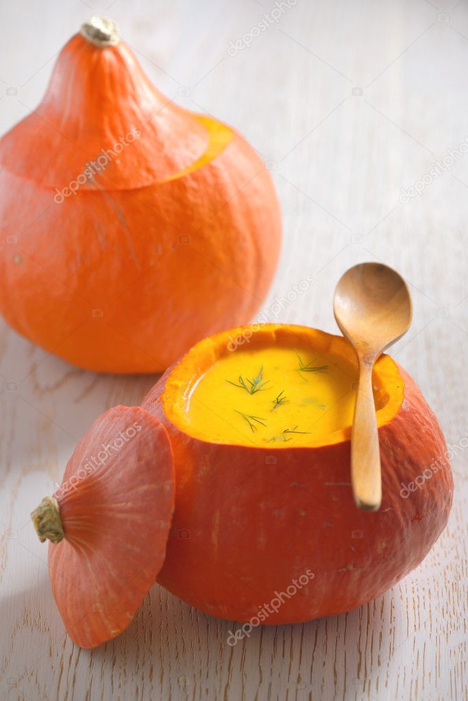 soup with cream in pumpkin