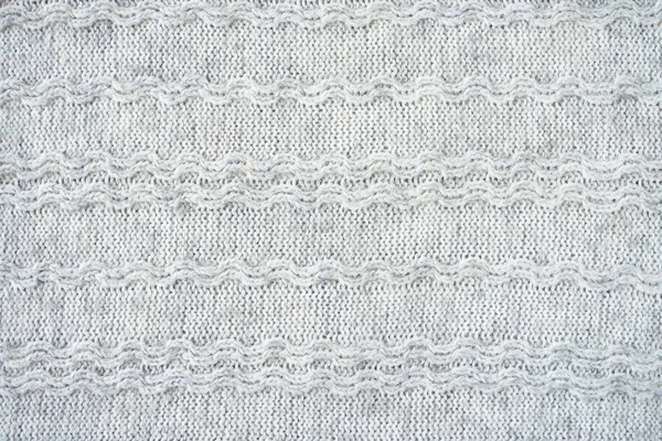 A textura do produto de lã. Fundo cinzento. — Fotografia de Stock