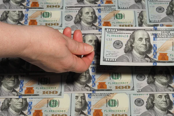 Az amerikai dollár, száz dolláros amerikai bankjegyek háttere. Benjamin Franklin vagyok. — Stock Fotó