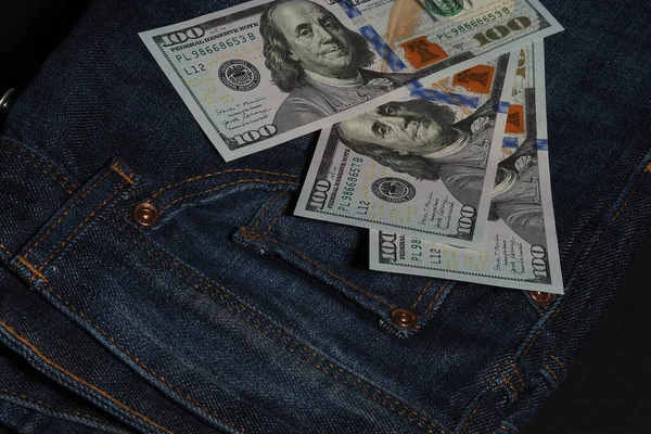 American dollar in the background of jeans, Symbol of America. — Stock Photo, Image