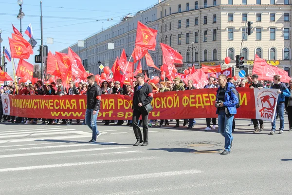 People with red banners and flags. — Stok fotoğraf