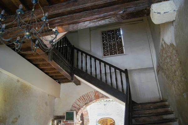 Wooden staircase and massive beams — Stock Photo, Image