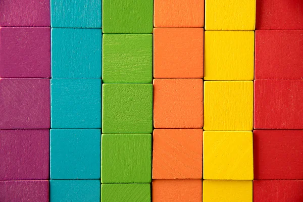 Colorful stack of wood cube building blocks