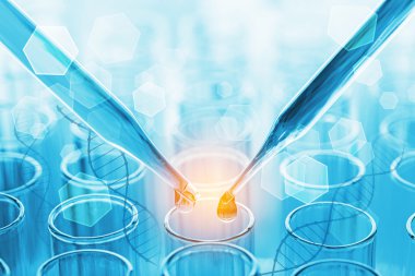 Madde laboratuvar test tüpü üzerinde bir damla ile bilim pipet