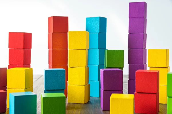 Colorful stack of wood cube building blocks