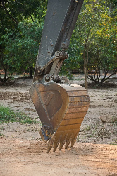 Excavator scoop on construction site — Stock Photo, Image