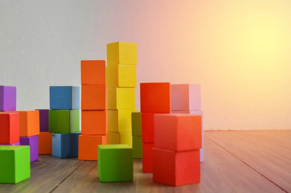 Colorful stack of wood cube building blocks