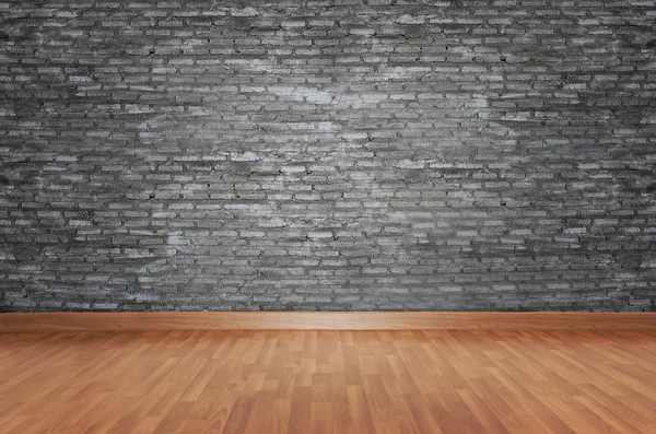 Brown wood plank floor with black brick texture wall — Stock Photo, Image