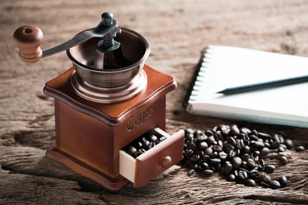 Coffee grinder on wooden table — Stock Photo, Image