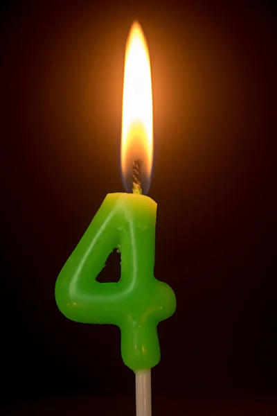 Свічка на день народження: номер 4 — стокове фото