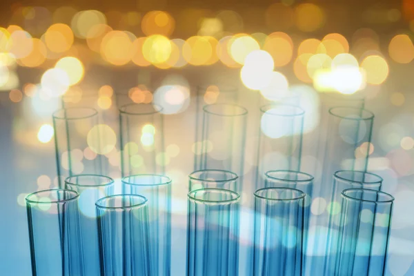 Double exposure of science laboratory test tubes with bokeh — Stock Photo, Image