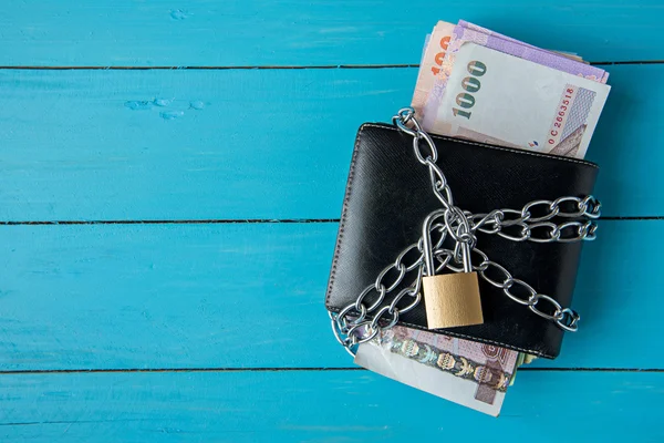 Locked thai money purse with metal chain link with padlock — Stock Photo, Image