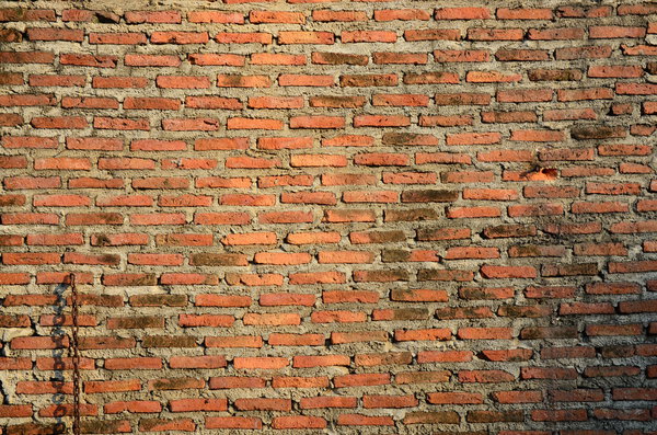 Red brick wall as background
