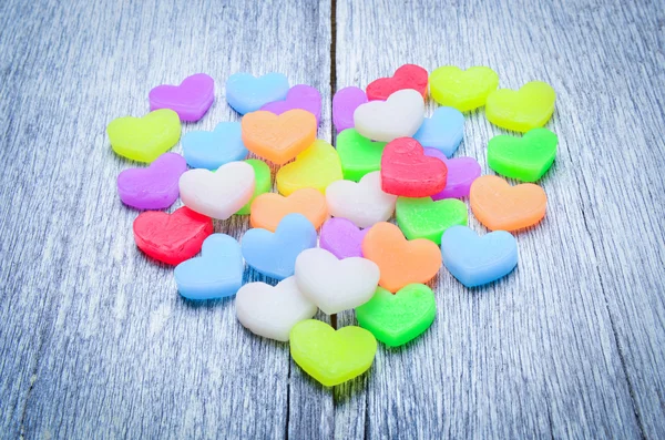 Many heart on wooden floor — Stock Photo, Image