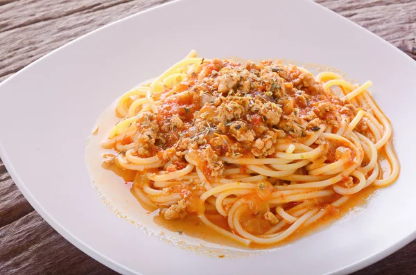 A portion of Italian spaghetti in white plate — Stock Photo, Image