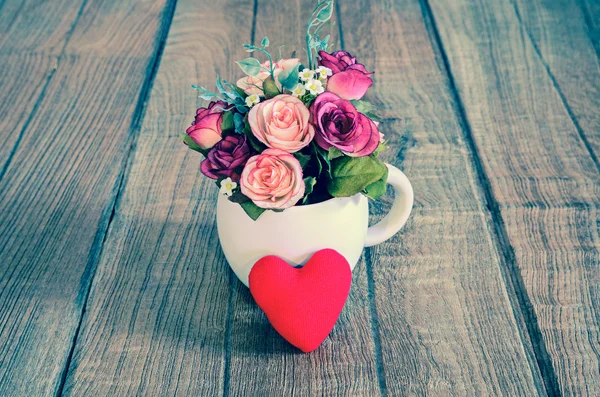 Vintage flower pot on wooden table background — Stock Photo, Image