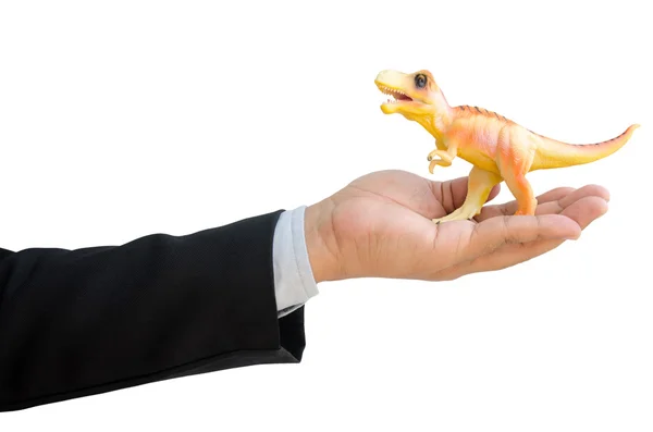 Бизнесмен с динозаврами в руке изолированы на белом фоне — стоковое фото