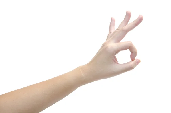 महिलाओं हाथ सफेद पृष्ठभूमि पर अलग चिह्न बनाने — स्टॉक फ़ोटो, इमेज