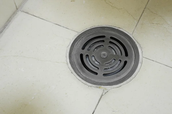 Drain water on the floor — Stock Photo, Image