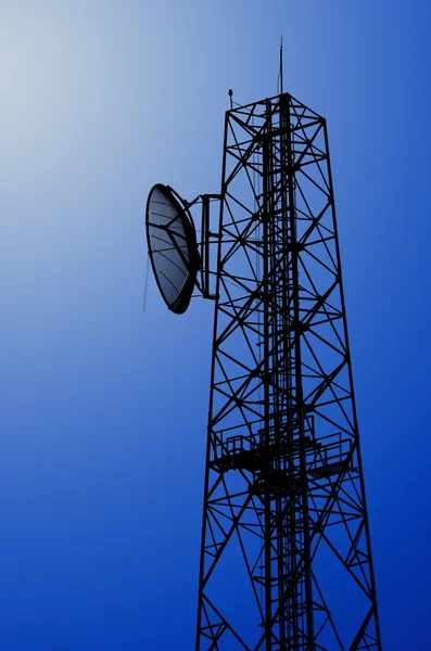 Silhouette communication tower — Stock Photo, Image