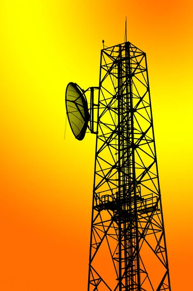 Silhouette communication tower — Stock Photo, Image