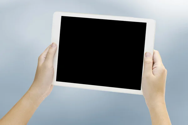 Mão mulher segurando o tablet telefone isolado no fundo branco — Fotografia de Stock