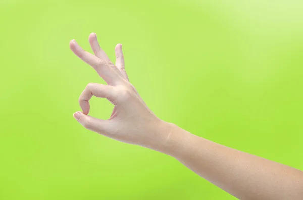 Women hand making sign isolated on white background — Stock Photo, Image