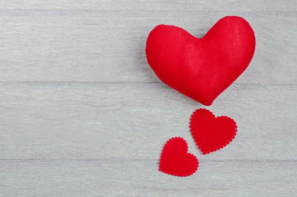 Red heart shape on wood background — Stock Photo, Image