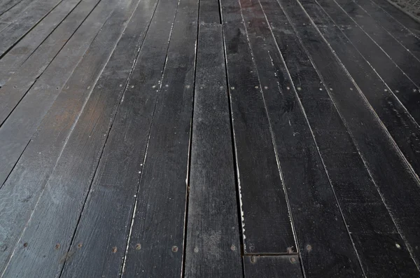 バック グラウンドのグランジ ブラック木製の床 — ストック写真