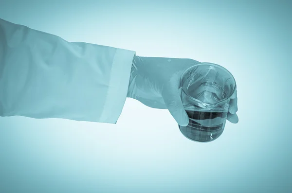 Scientist hand holding test tubes — Stock Photo, Image