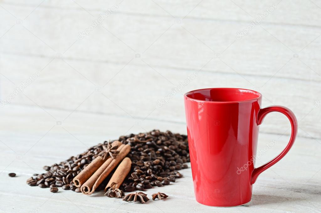 Red coffee cup on wooden table