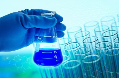 Test tüpleri, laboratuvar araştırma kavramı tutan bilim adamı el