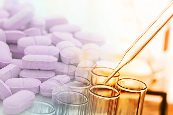 Laboratory test tubes and drug — Stock Photo, Image