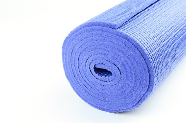Yoga mat beyaz arka plan üzerinde egzersiz için