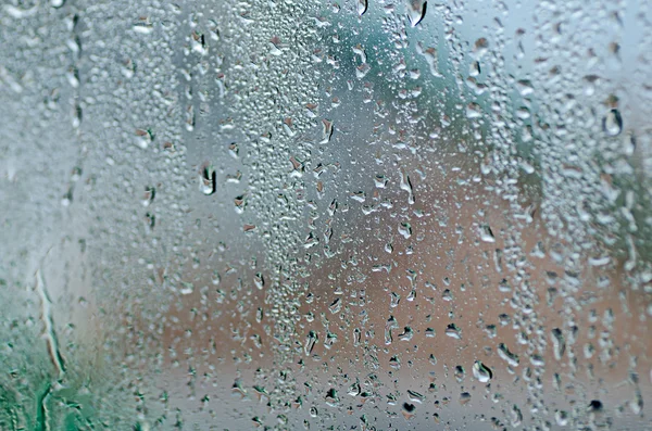 Gotas de agua natural en la ventana de vidrio —  Fotos de Stock