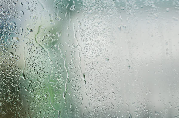 Natural water drops on glass window — Stock Photo, Image