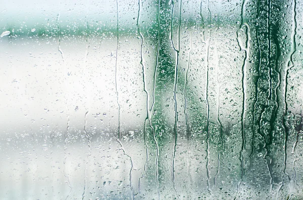 Natural water drops on glass window — Stock Photo, Image