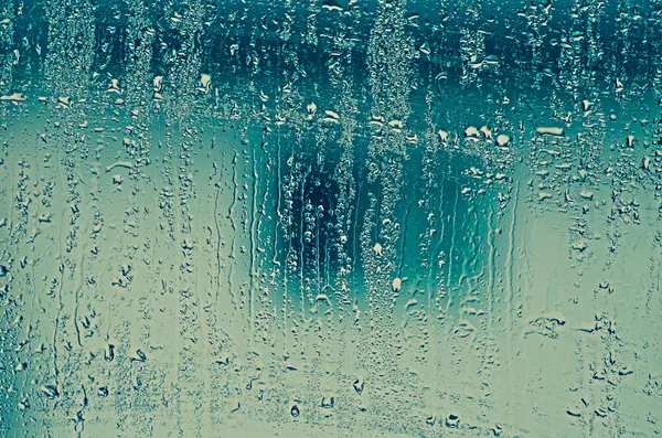 Natural water drops on glass window — Stock Photo, Image