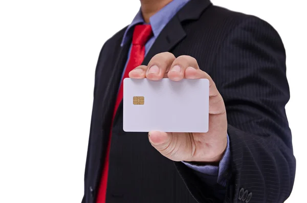 Biznesmen przytrzymanie puste karty inteligentnej na białym tle na biały deseń — Zdjęcie stockowe