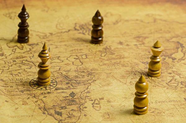 Chess on old map — Stock Photo, Image