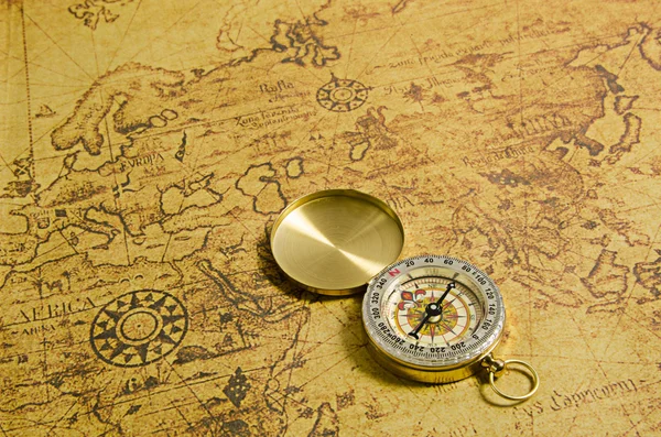 Compass on old map — Stock Photo, Image