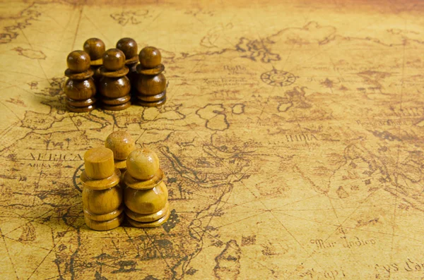 Chess on old map — Stock Photo, Image